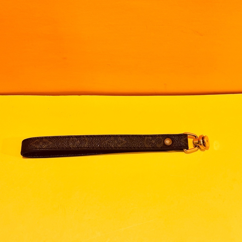 Louis Vuitton Black Strap with Gold Accent